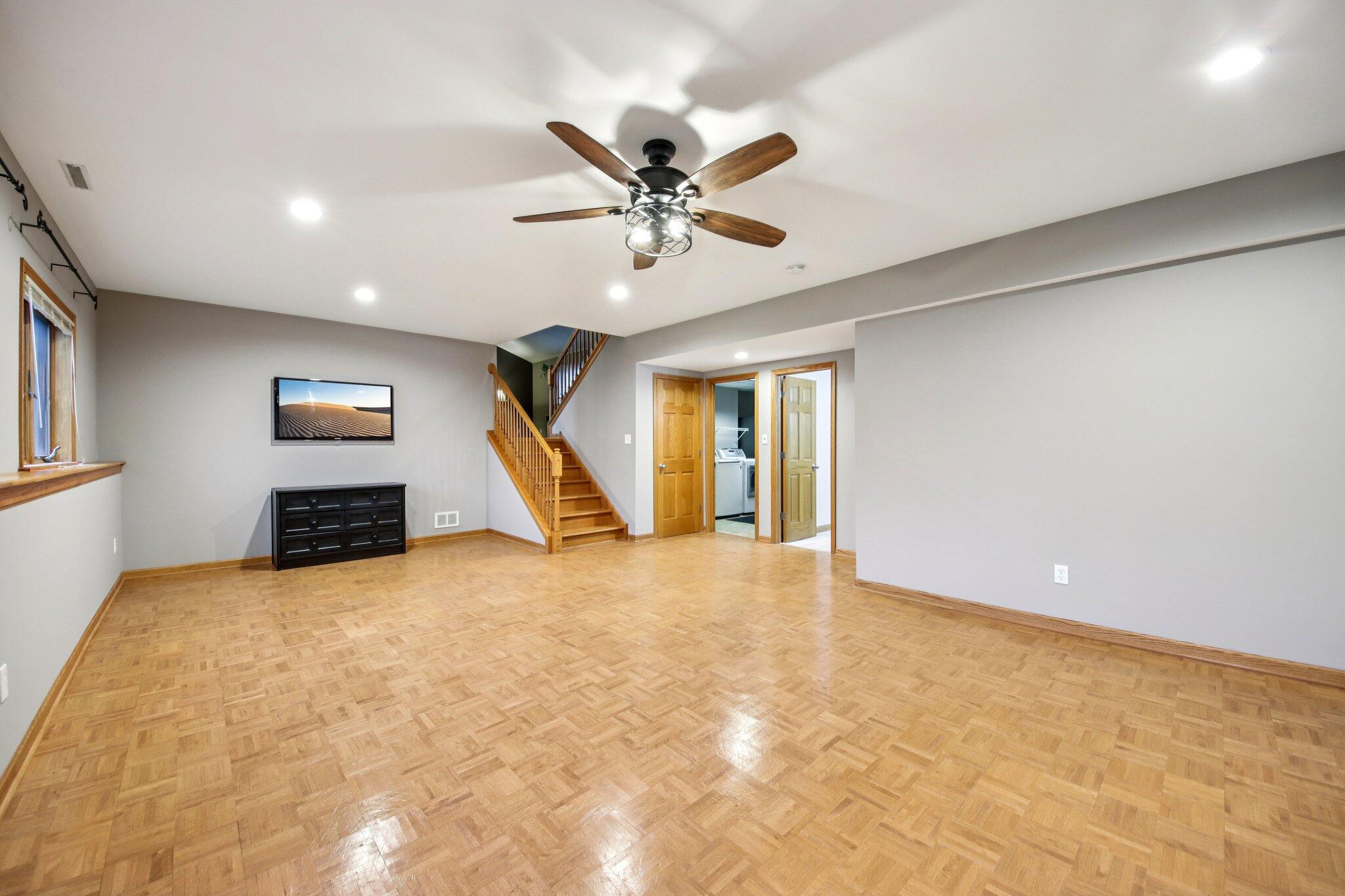 9396 Calumet Street Dyer, IN 46311 - Photo 31 of 43 a view of a livingroom with a ceiling fan and window