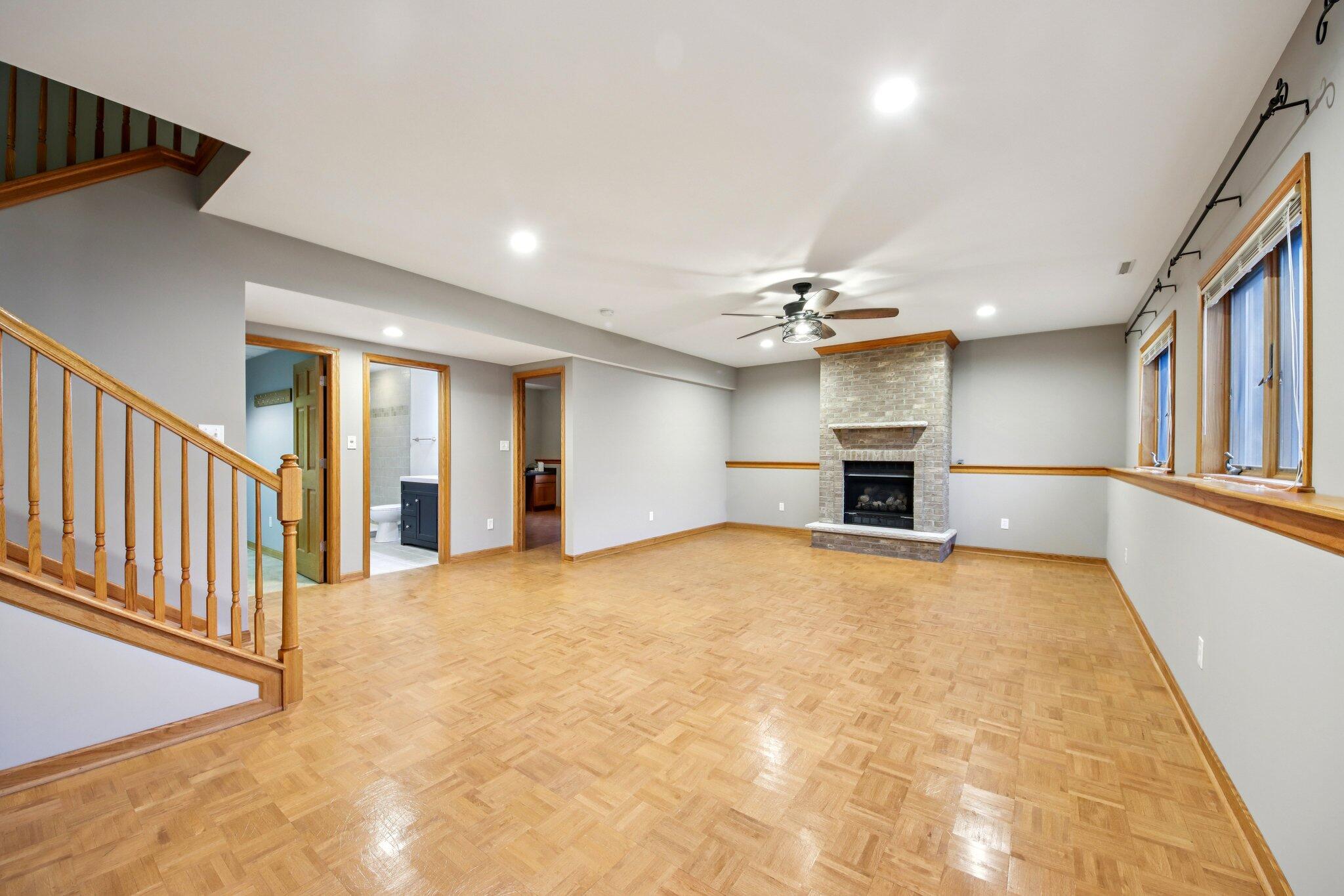 9396 Calumet Street Dyer, IN 46311 - Photo 33 of 43 a view of an empty room with a window and fireplace