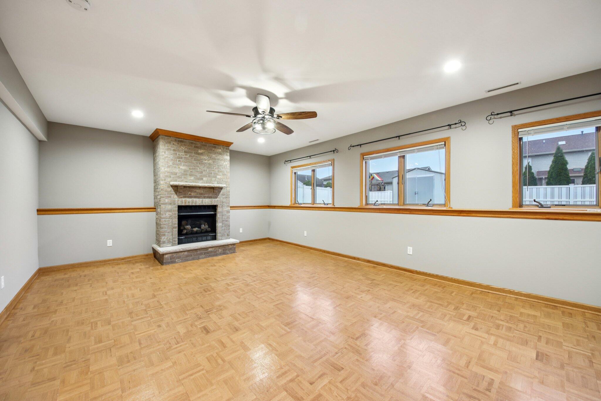 9396 Calumet Street Dyer, IN 46311 - Photo 34 of 43 an empty room with windows and fireplace