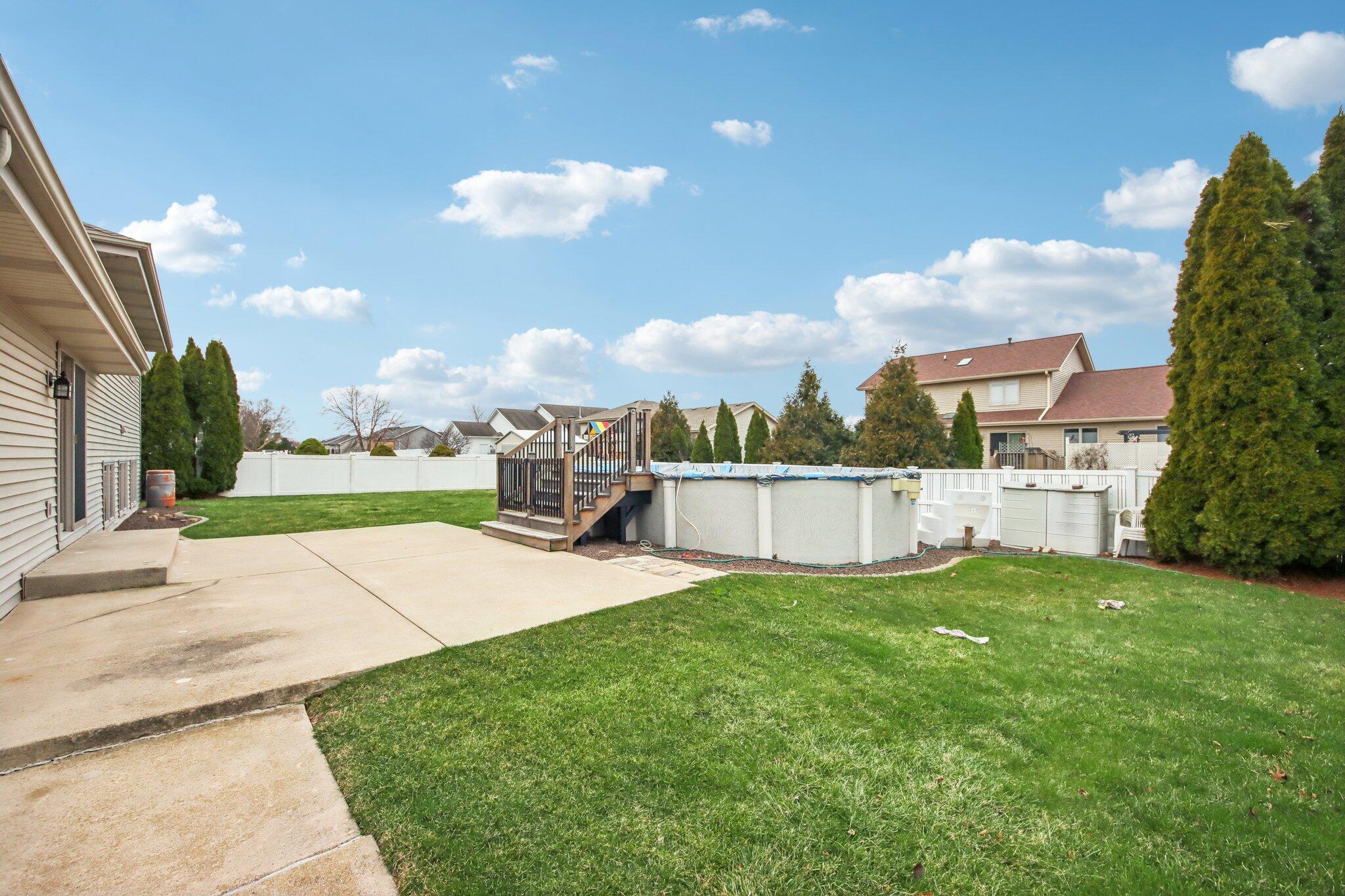 9396 Calumet Street Dyer, IN 46311 - Photo 39 of 43 a view of a house with a yard and a fountain