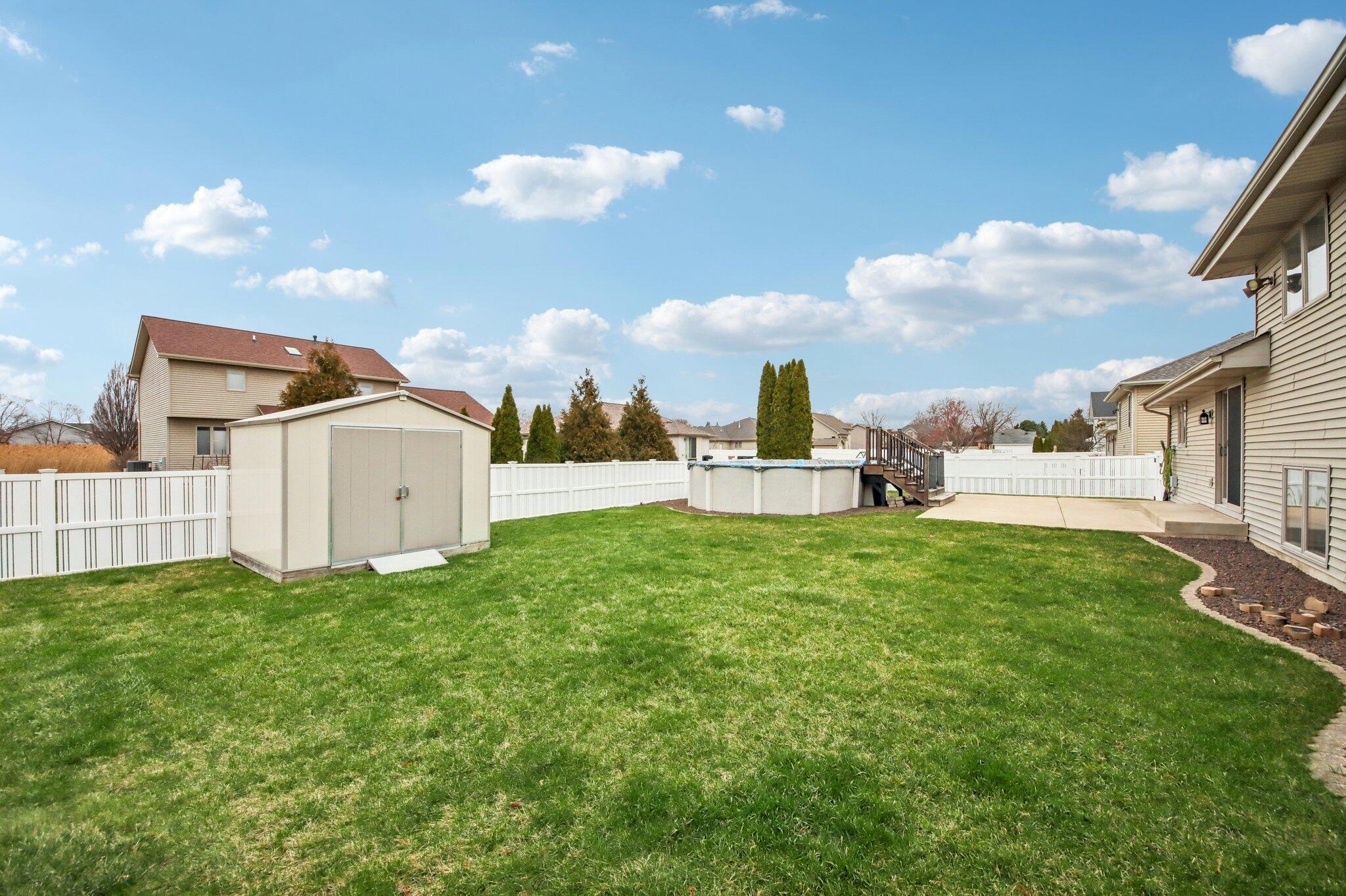 9396 Calumet Street Dyer, IN 46311 - Photo 41 of 43 a view of a house with backyard and garden