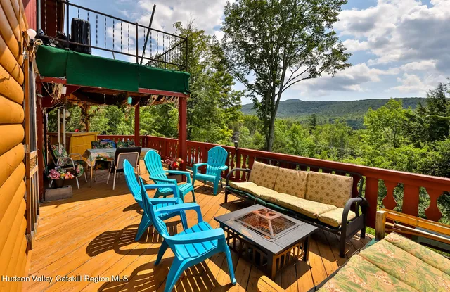 a bathroom with a toilet and a shower curtain