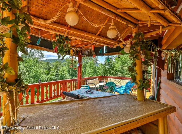 a bed room with a bed and a potted plant