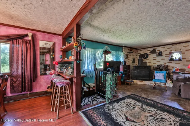 a view of house with snow on the road