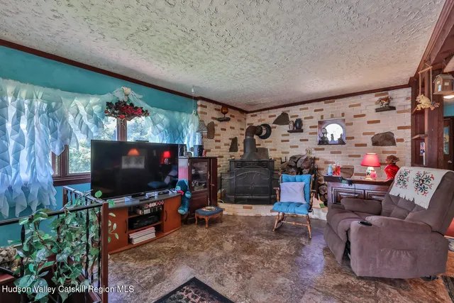a view of a balcony with chairs