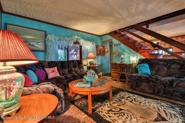 a kitchen with a sink stove and refrigerator