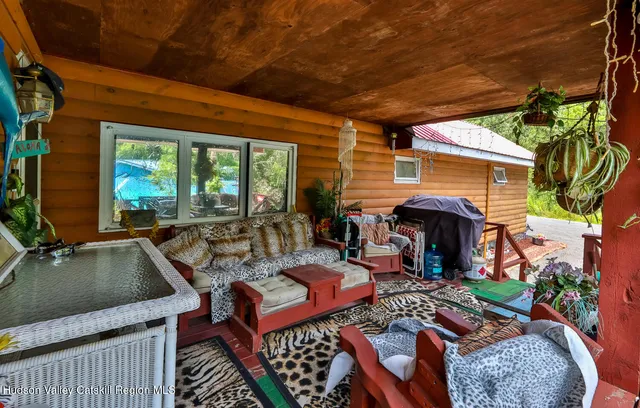 a view of a backyard with barn and a yard