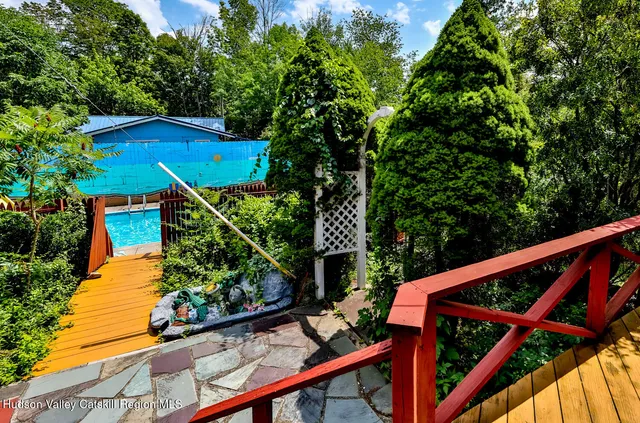 a bedroom with a bed and a table