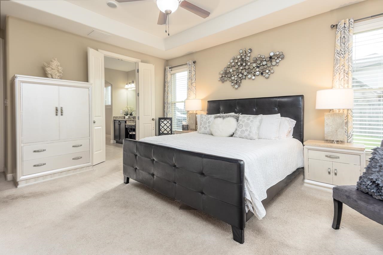 771 Six Oaks Lane Collierville, TN 38017 - Photo 11 of 25 a bedroom with a bed and a window