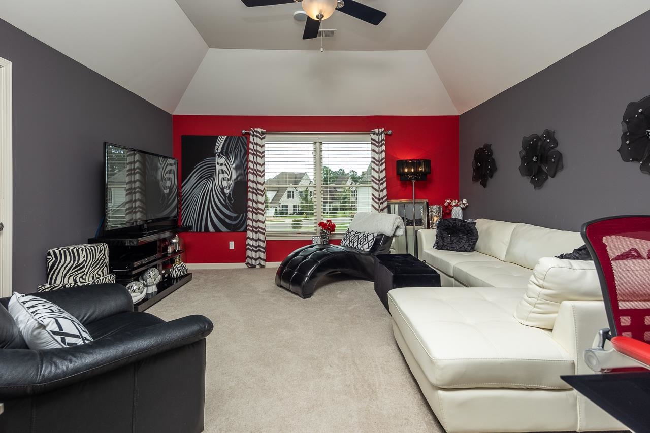 771 Six Oaks Lane Collierville, TN 38017 - Photo 15 of 25 a living room with furniture and a window