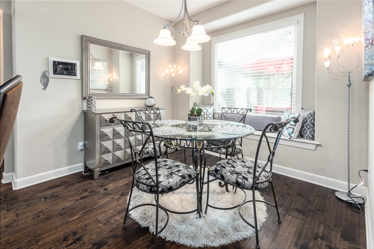 771 Six Oaks Lane Collierville, TN 38017 - Photo 7 of 25 a view of a dining room with furniture window and wooden floor