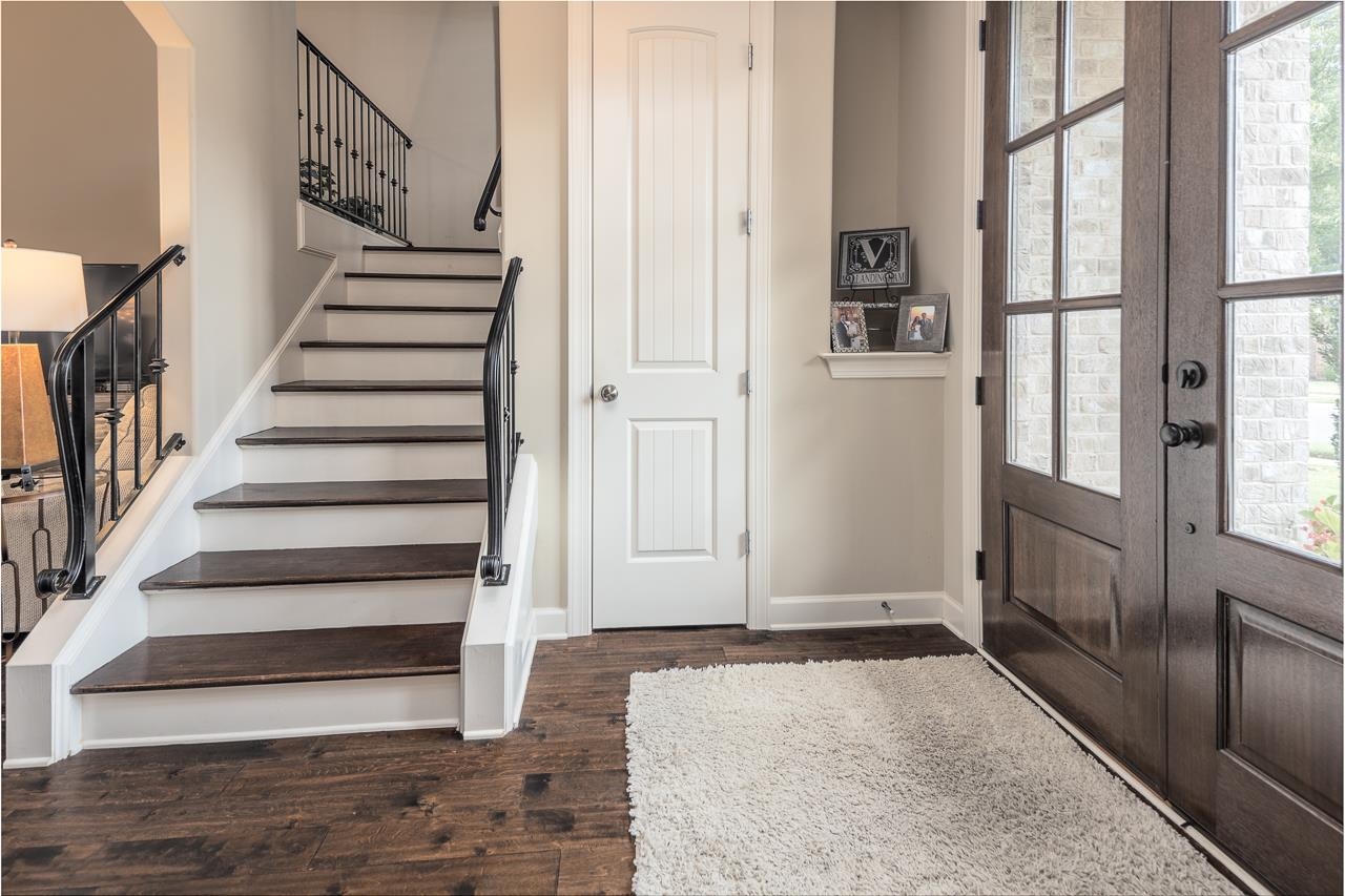 771 Six Oaks Lane Collierville, TN 38017 - Photo 8 of 25 a view of entryway with wooden floor and stairs