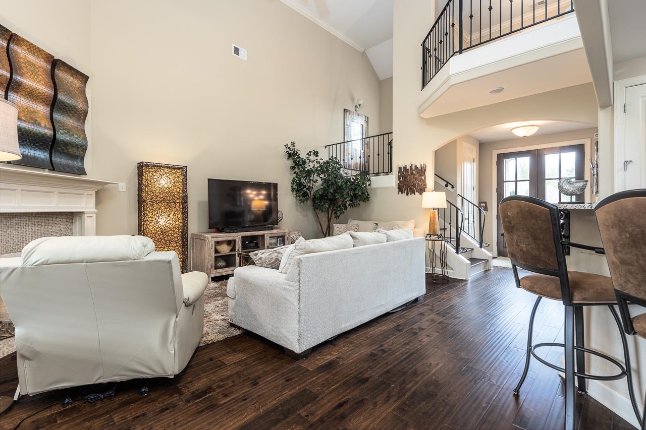 771 Six Oaks Lane Collierville, TN 38017 - Photo 9 of 25 a living room with furniture and a flat screen tv