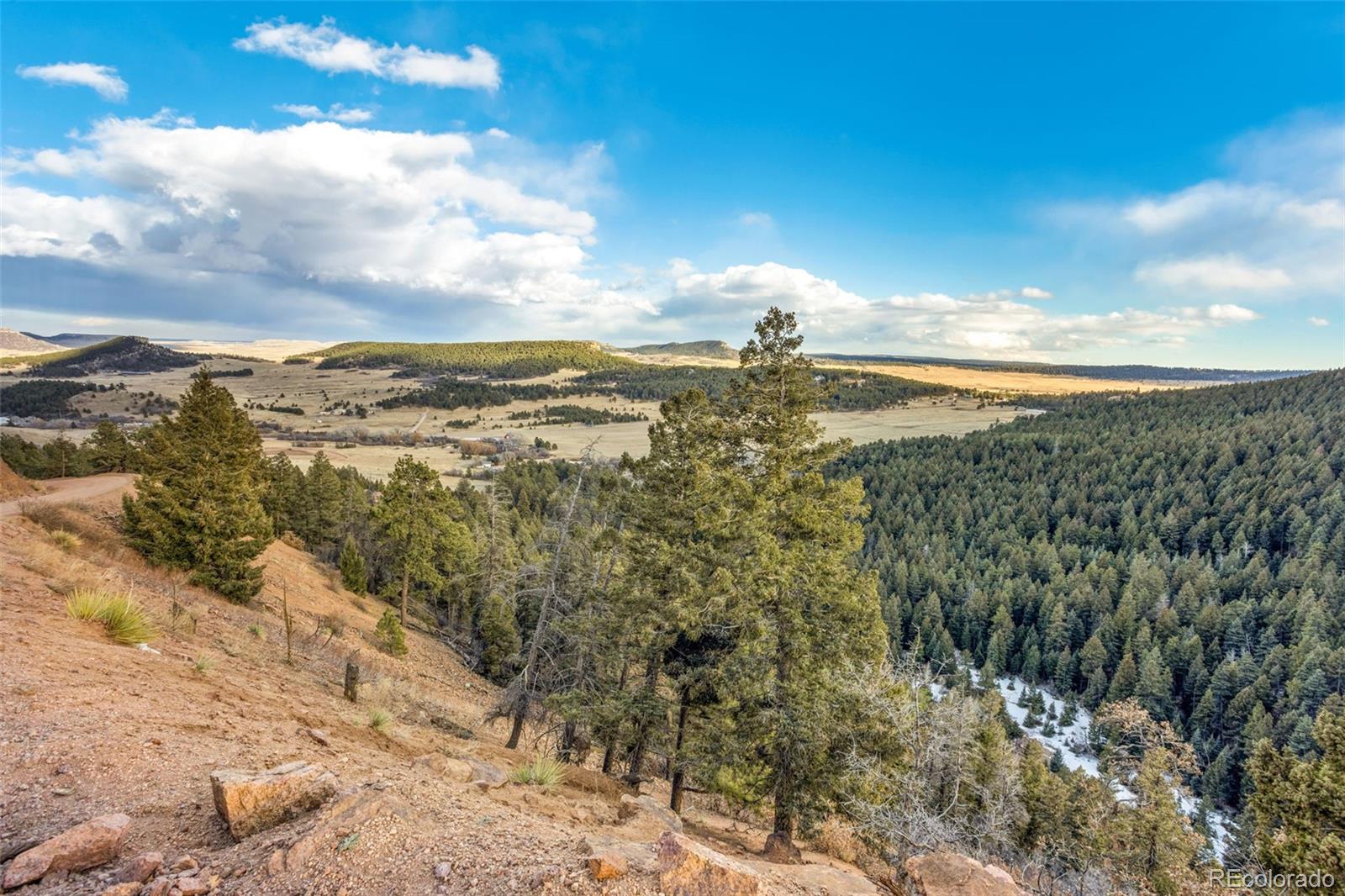Mountain Ranch Road Larkspur, CO 80118 - Photo 8 of 17 a view of a city with top of mountains