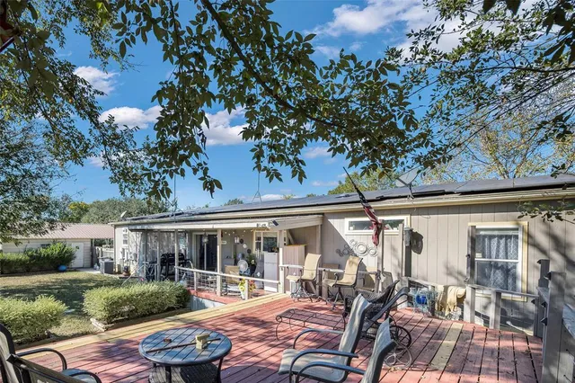 an aerial view of residential house with outdoor space