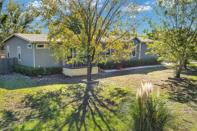a view of a swimming pool with an outdoor seating