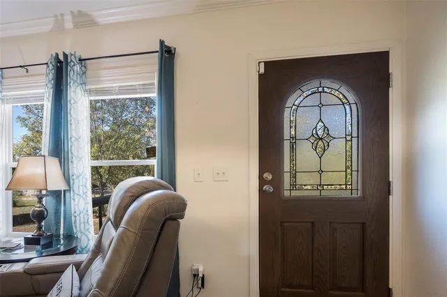 a room with furniture and a window