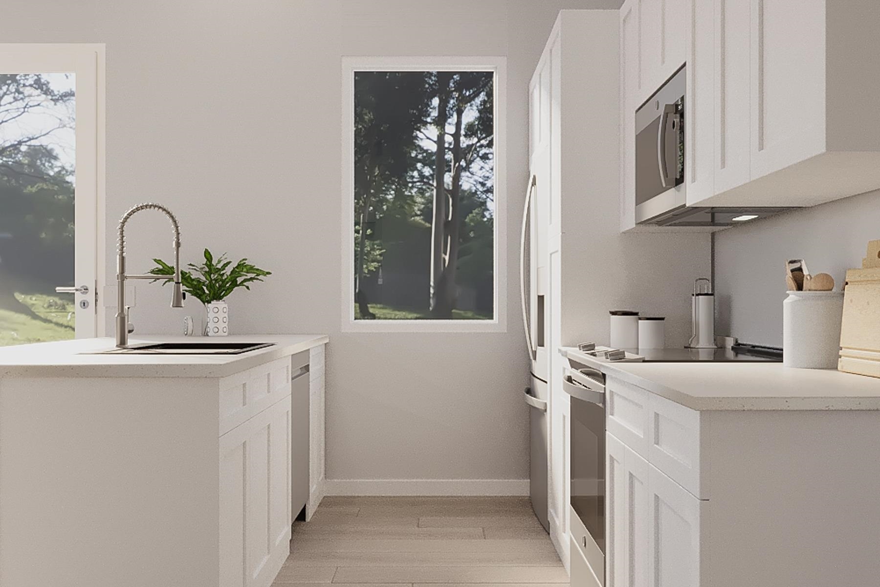 26 South Whitney Street St. Augustine, FL 32084 - Photo 3 of 21 a view of a sink and a microwave