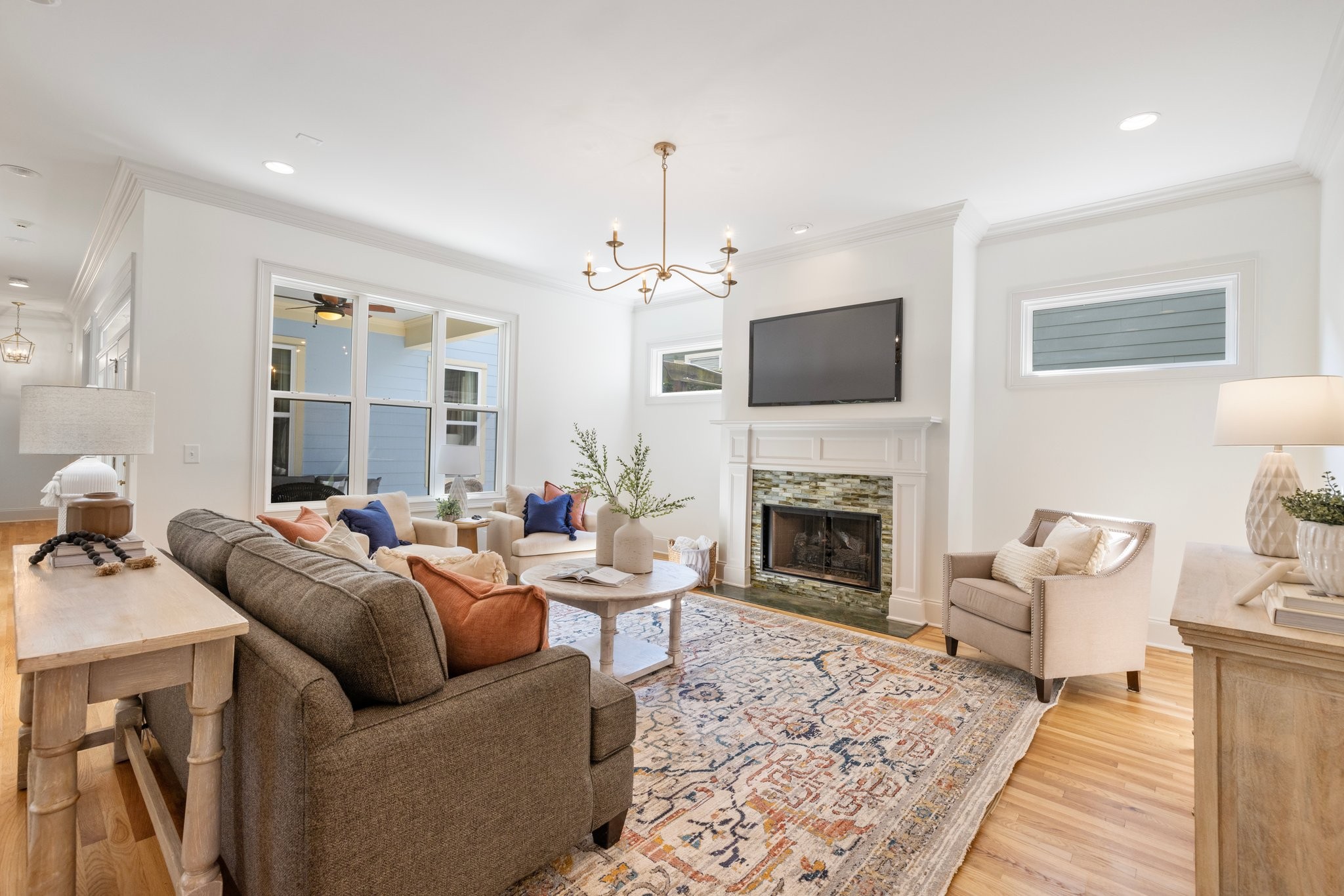 2019 Tabitha Drive Franklin, TN 37064 - Photo 13 of 69 a living room with furniture a fireplace and a flat screen tv