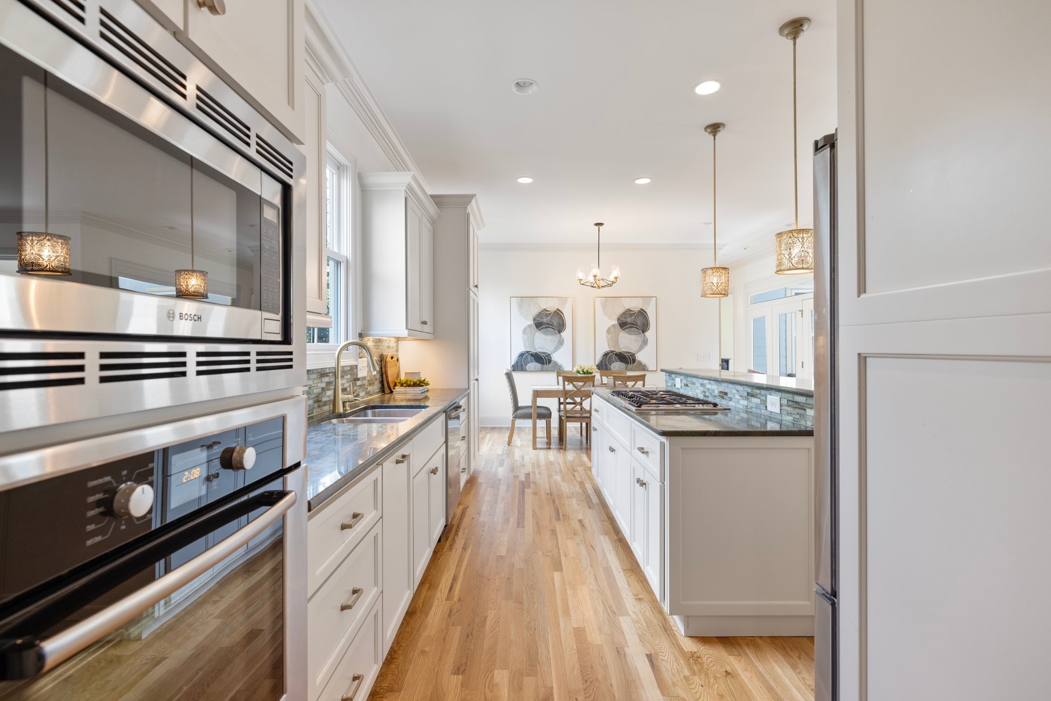 2019 Tabitha Drive Franklin, TN 37064 - Photo 17 of 69 a kitchen with stainless steel appliances granite countertop a stove and a sink