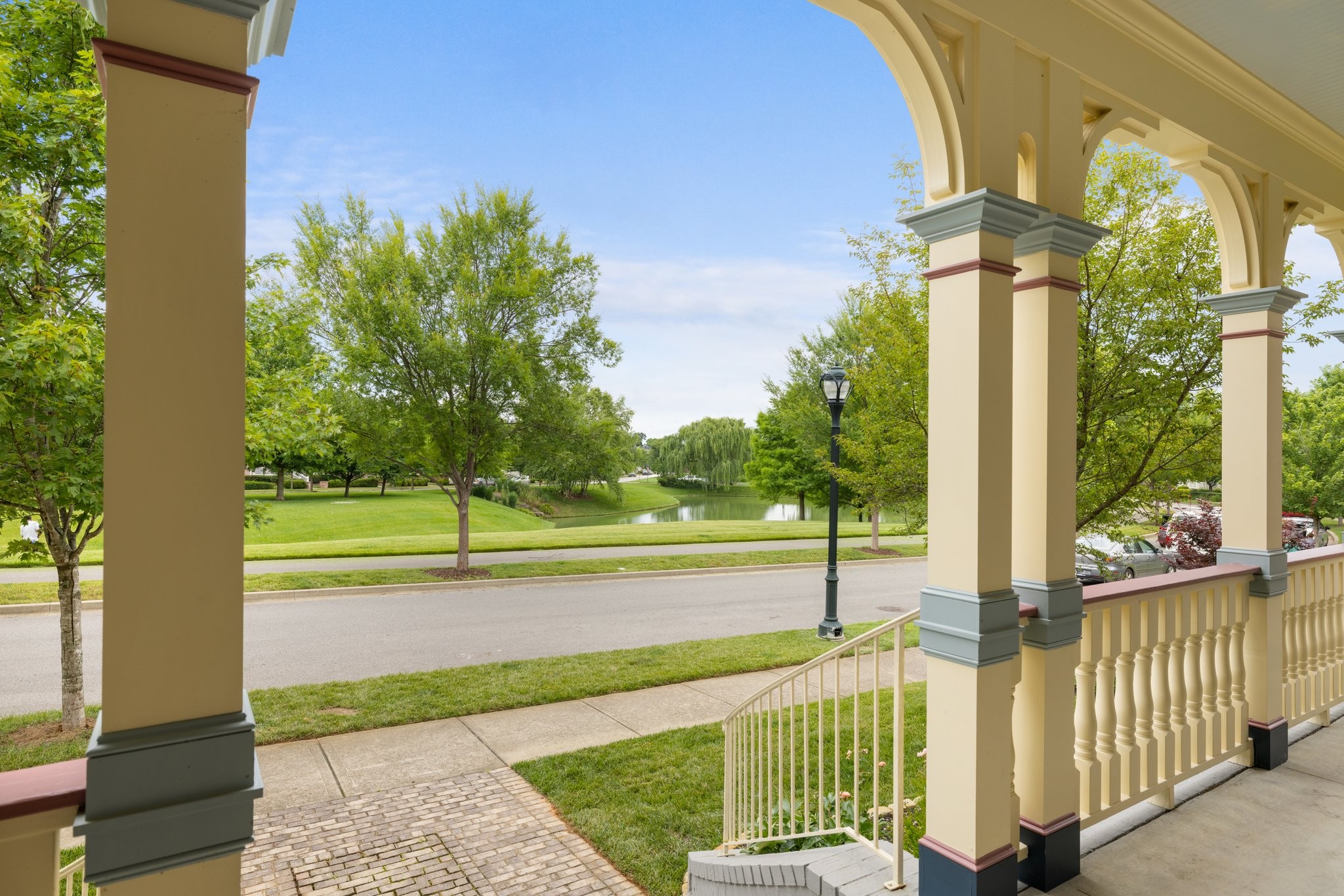 2019 Tabitha Drive Franklin, TN 37064 - Photo 3 of 69 a view of a porch with a floor to ceiling window and a yard