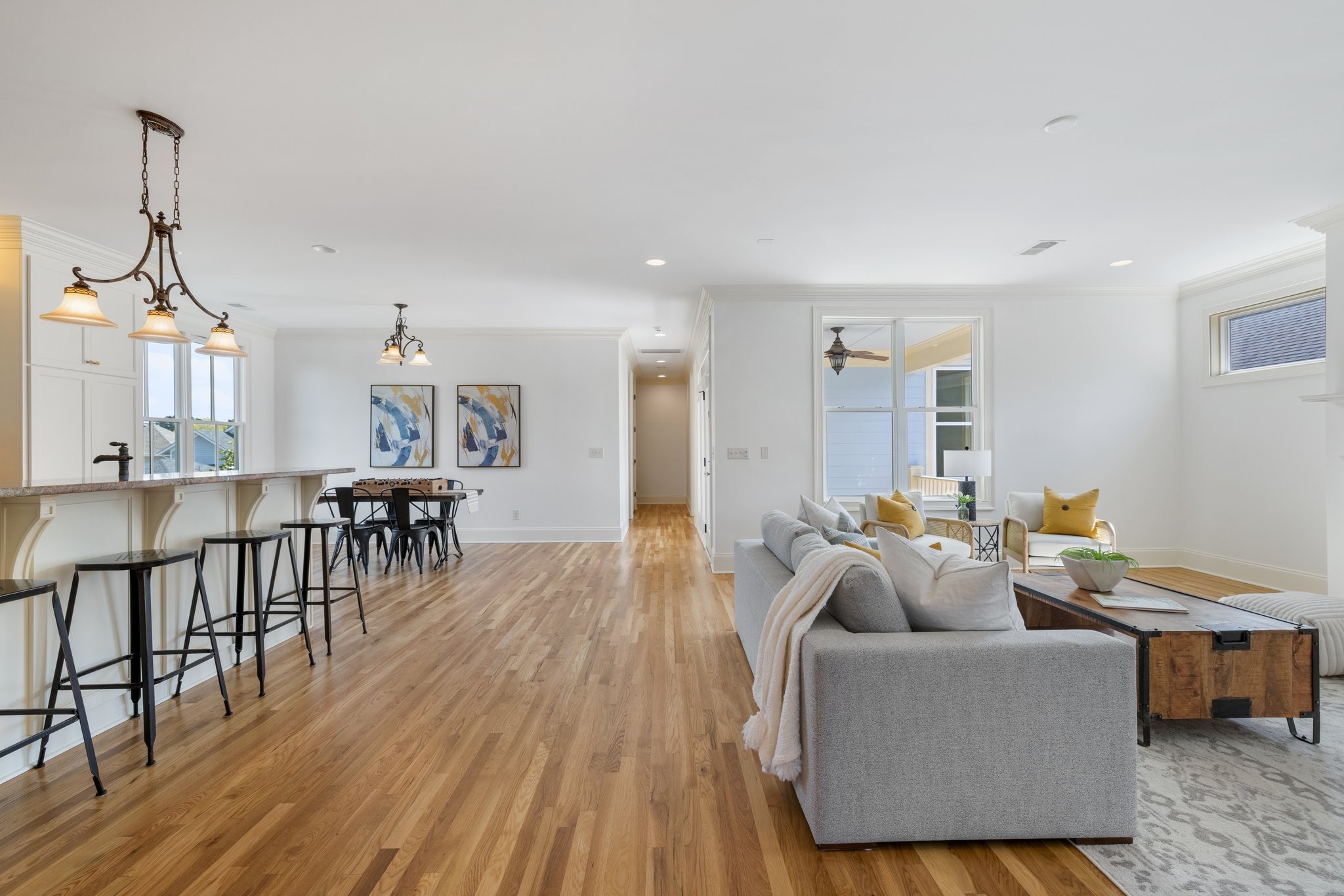 2019 Tabitha Drive Franklin, TN 37064 - Photo 34 of 69 a living room with furniture a wooden floor and a chandelier