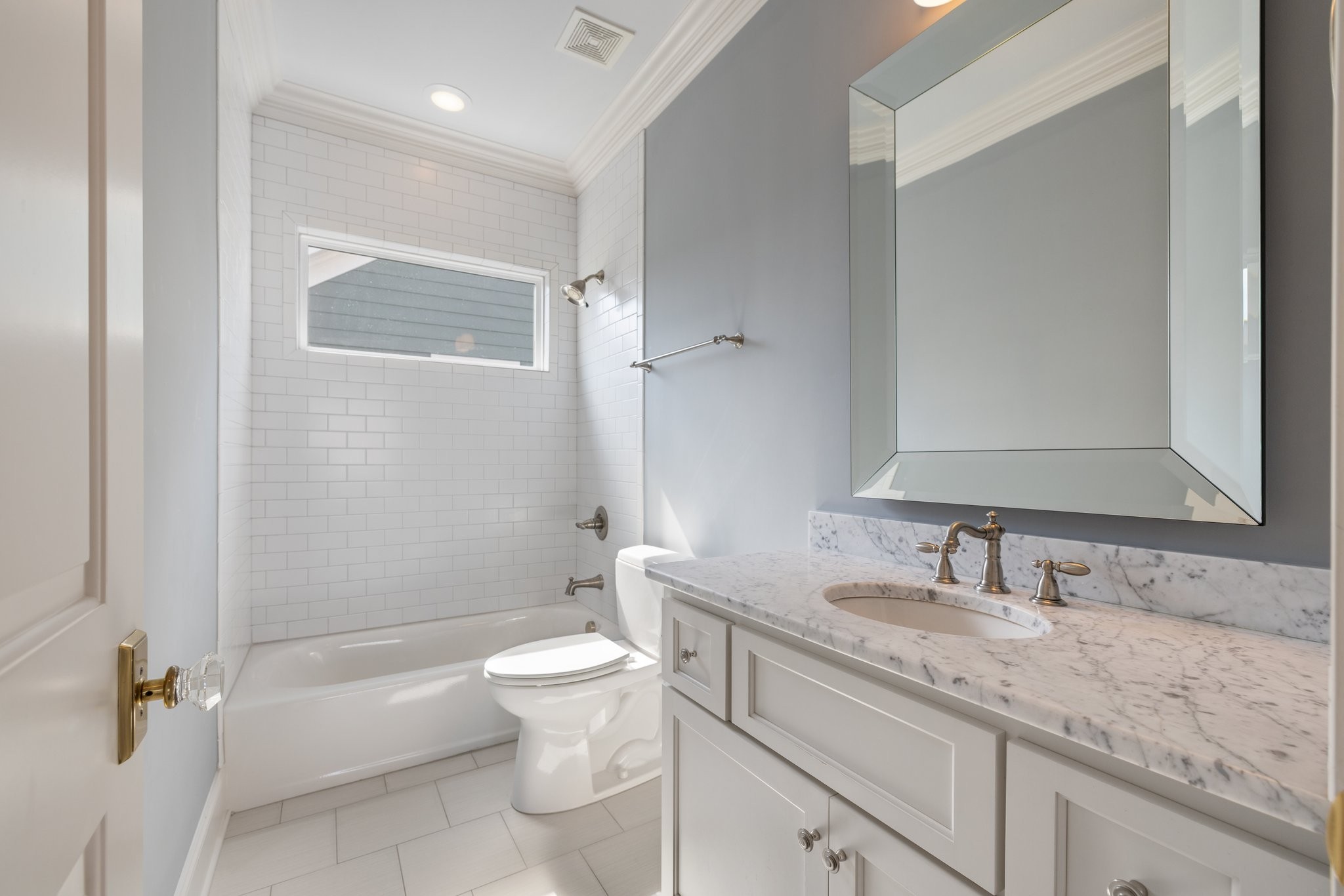 2019 Tabitha Drive Franklin, TN 37064 - Photo 53 of 69 a bathroom with a granite countertop sink a toilet and shower