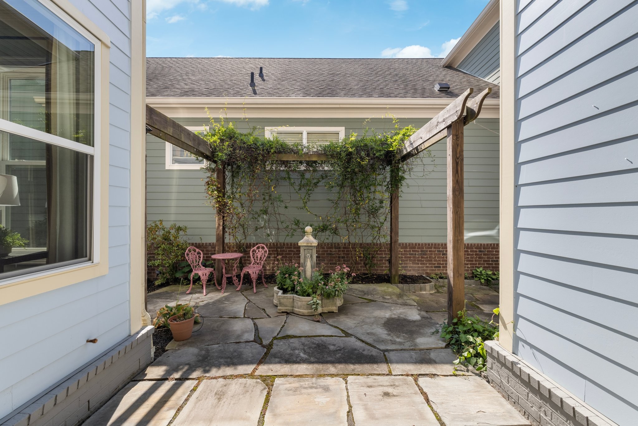 2019 Tabitha Drive Franklin, TN 37064 - Photo 55 of 69 a view of a patio with table and chairs and potted plants