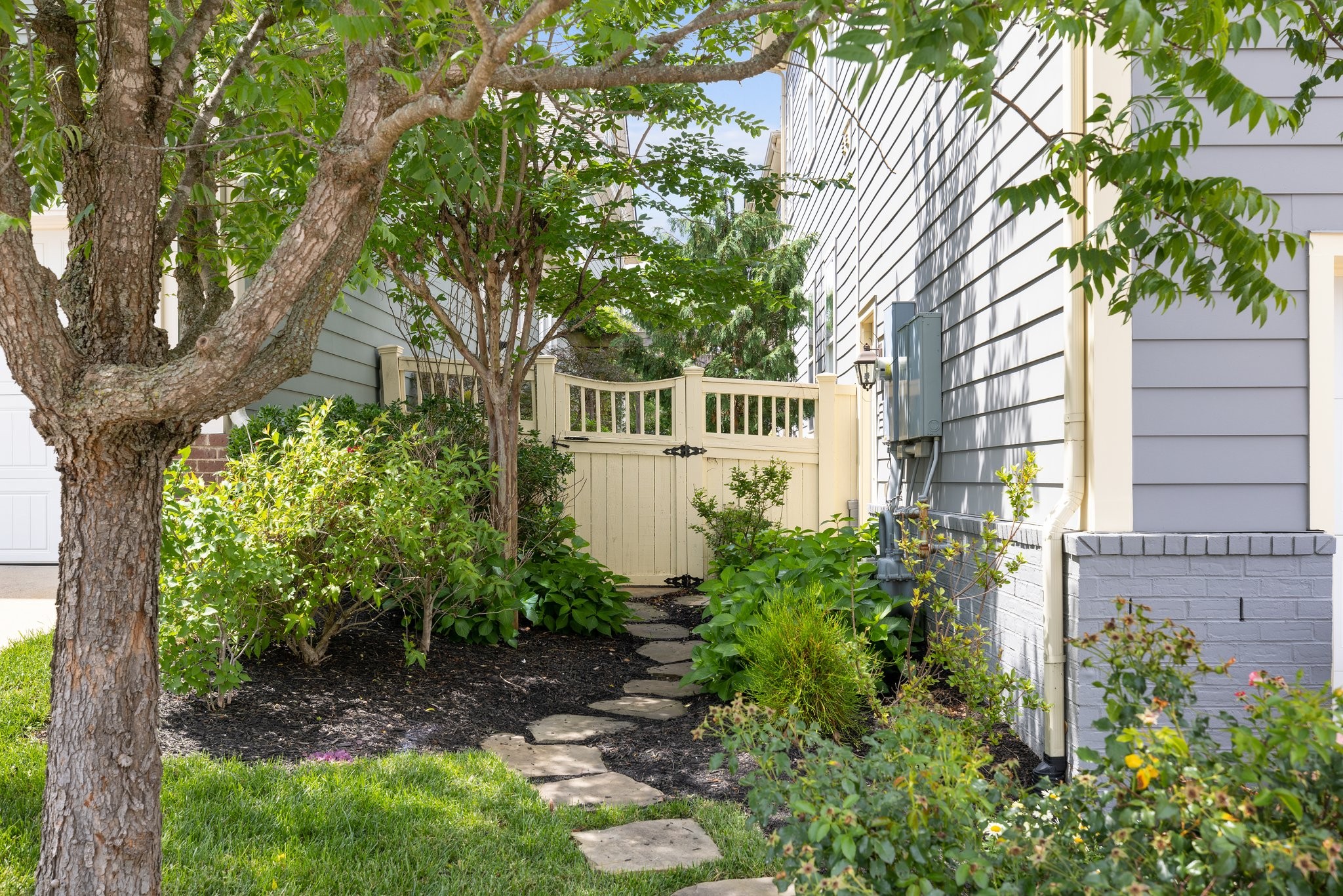 2019 Tabitha Drive Franklin, TN 37064 - Photo 56 of 69 a view of a house with a tree and plants
