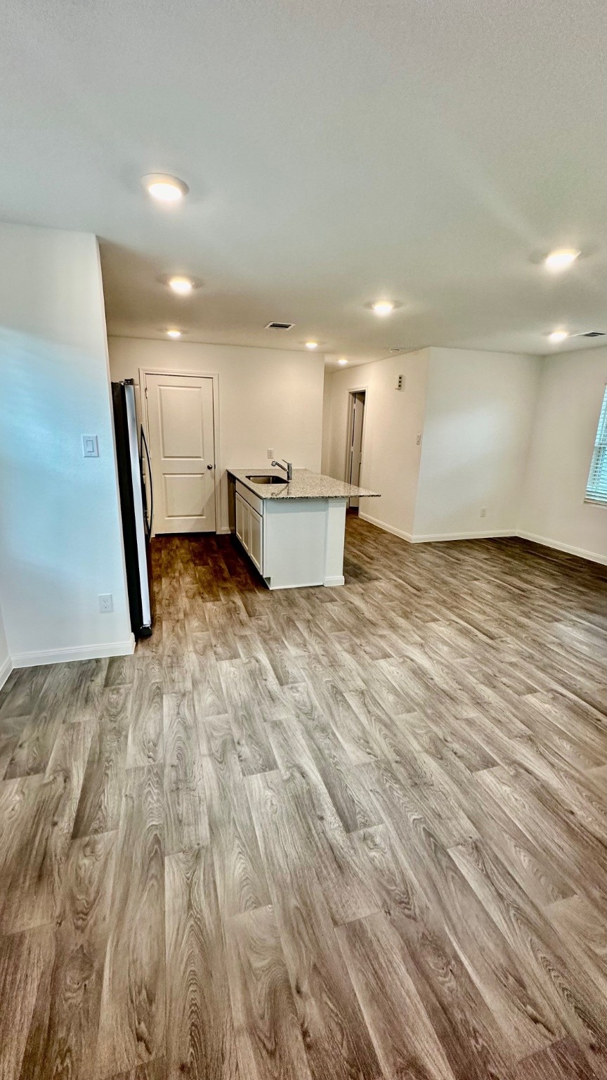 11926 Midas Lane Willis, TX 77378 - Photo 7 of 28 a view of a kitchen with a sink