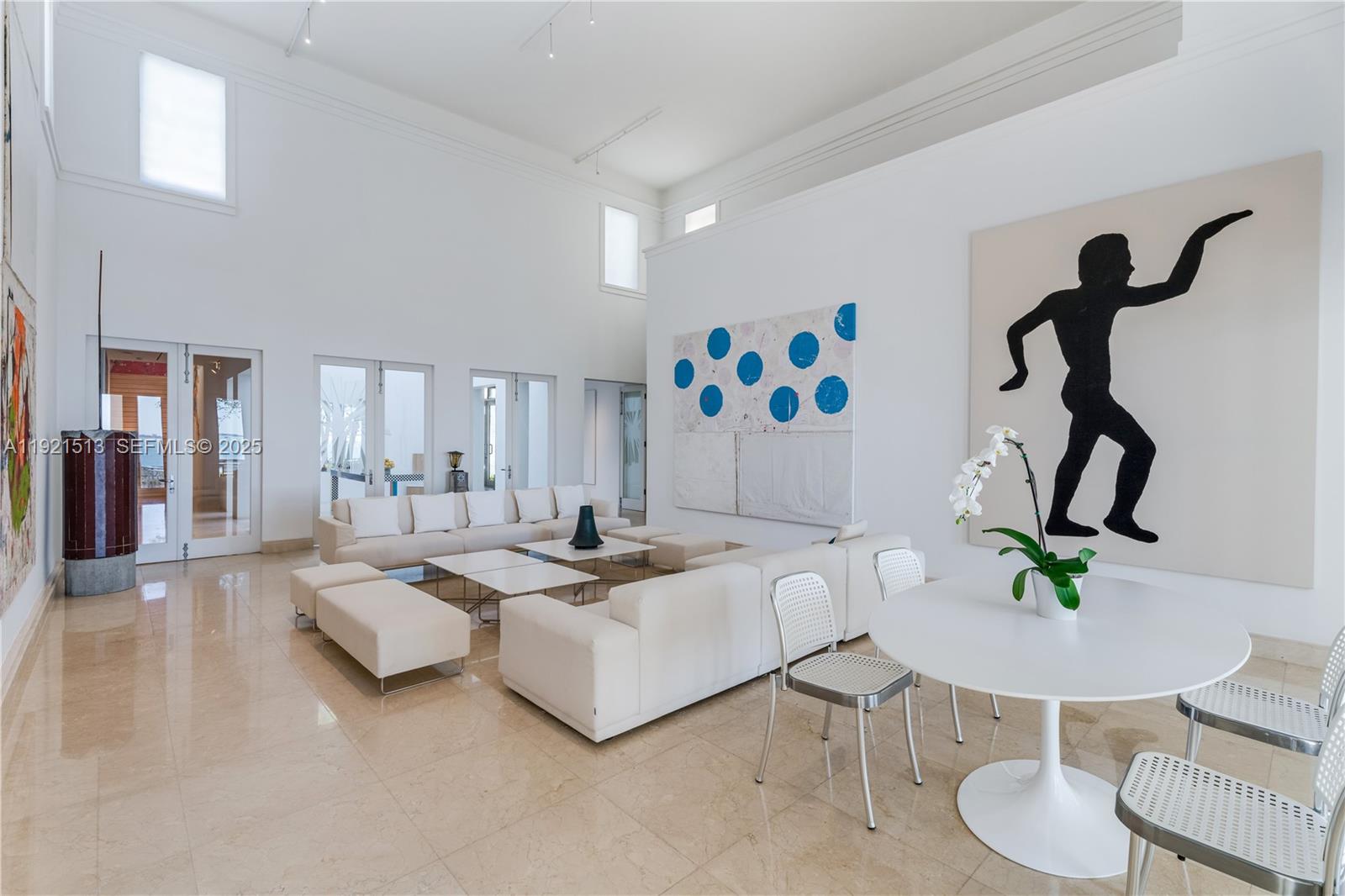 5 Harbor Point Key Biscayne, FL 33149 - Photo 22 of 81 a living room with furniture and a table