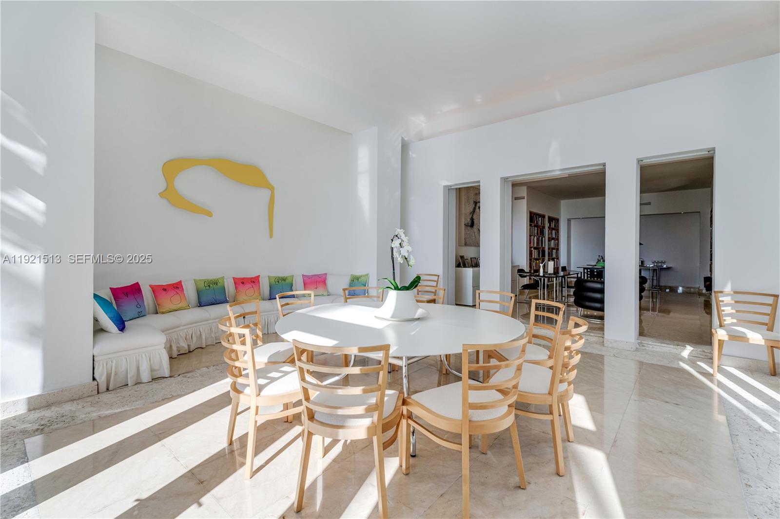 5 Harbor Point Key Biscayne, FL 33149 - Photo 29 of 81 a view of a dining room with furniture and wooden floor