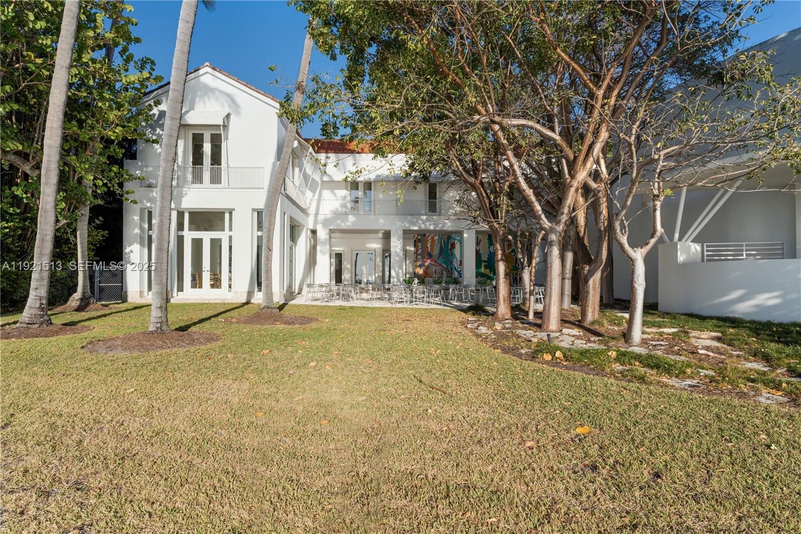 5 Harbor Point Key Biscayne, FL 33149 - Photo 72 of 81 a house with trees in front of it