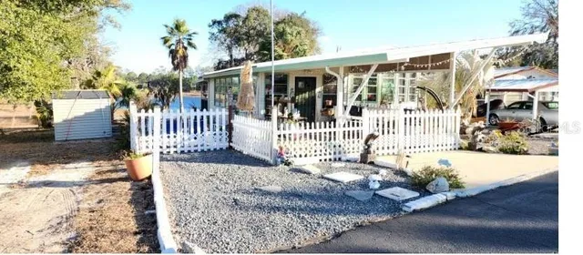 a front view of a house with a porch
