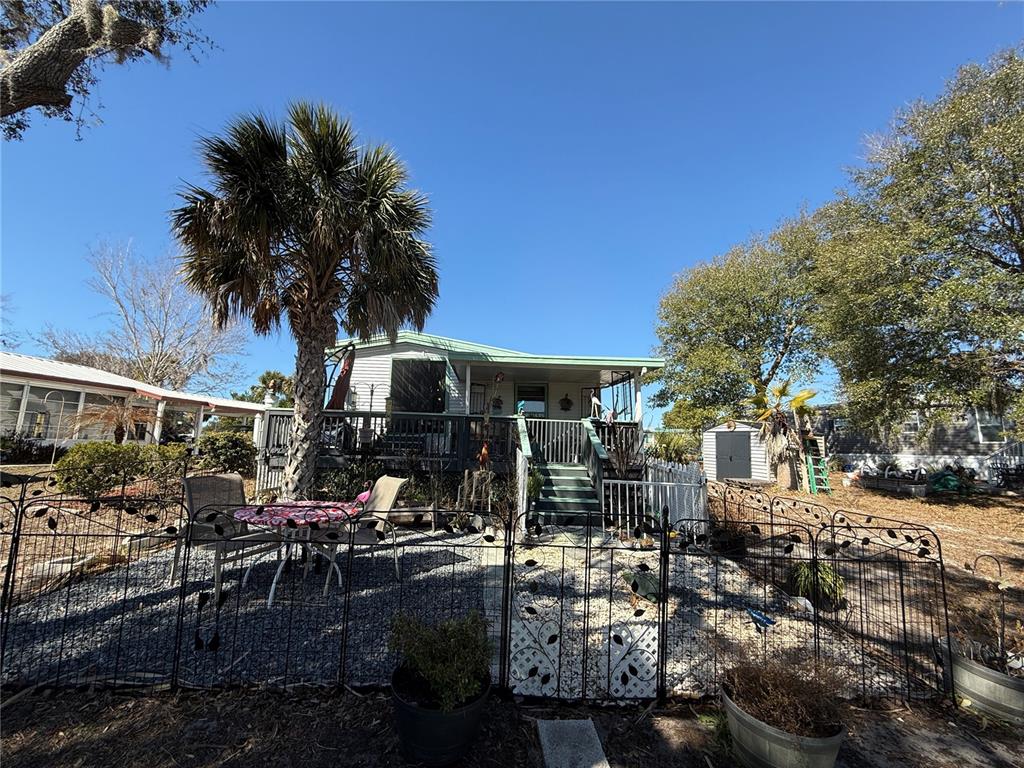9408 Cougar Drive Weeki Wachee, FL 34613 - Photo 15 of 27 a view of outdoor space yard and patio