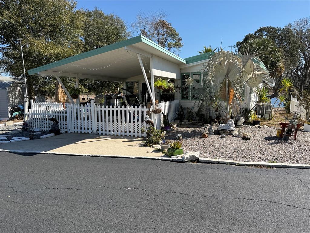 9408 Cougar Drive Weeki Wachee, FL 34613 - Photo 23 of 27 a view of outdoor space yard and patio
