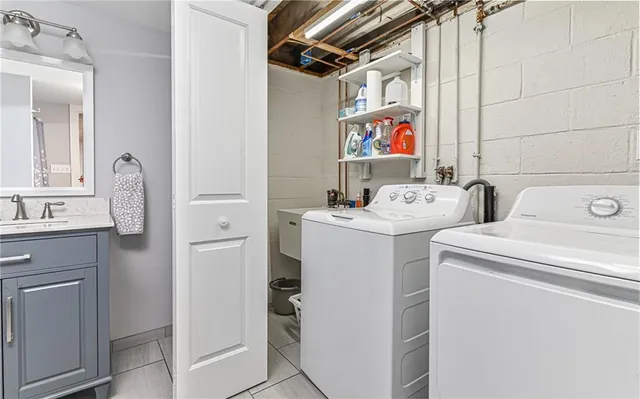 a utility room with dryer and washer
