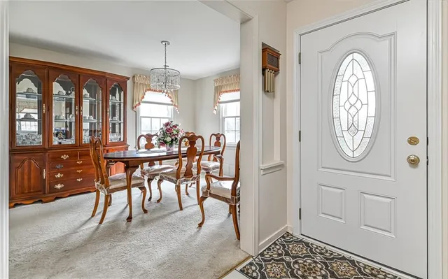 a view of a livingroom with furniture and window