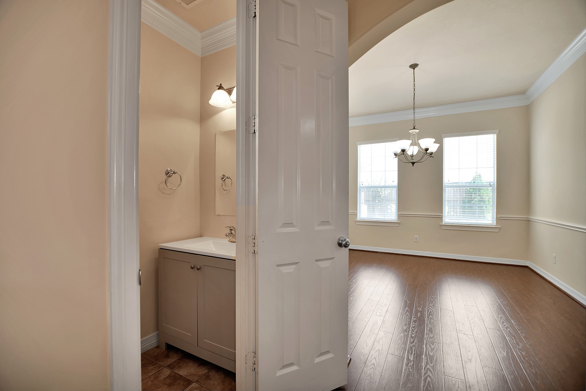 14459 Basalt Lane Houston, TX 77077 - Photo 18 of 35 View of the powder bath on 1st floor and dining area.