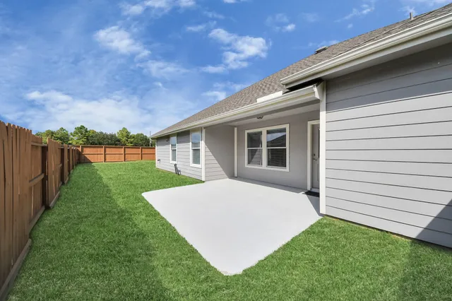 a view of a backyard with a garden
