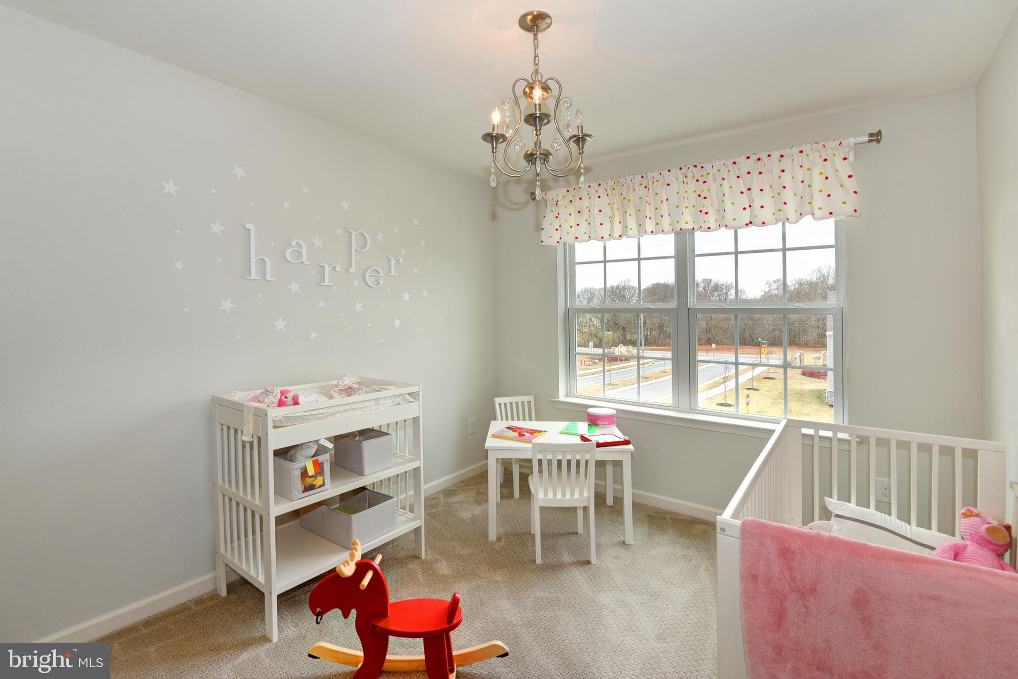 442 Rederick Lane Middletown, DE 19709 - Photo 11 of 22 a living room with furniture and a chandelier