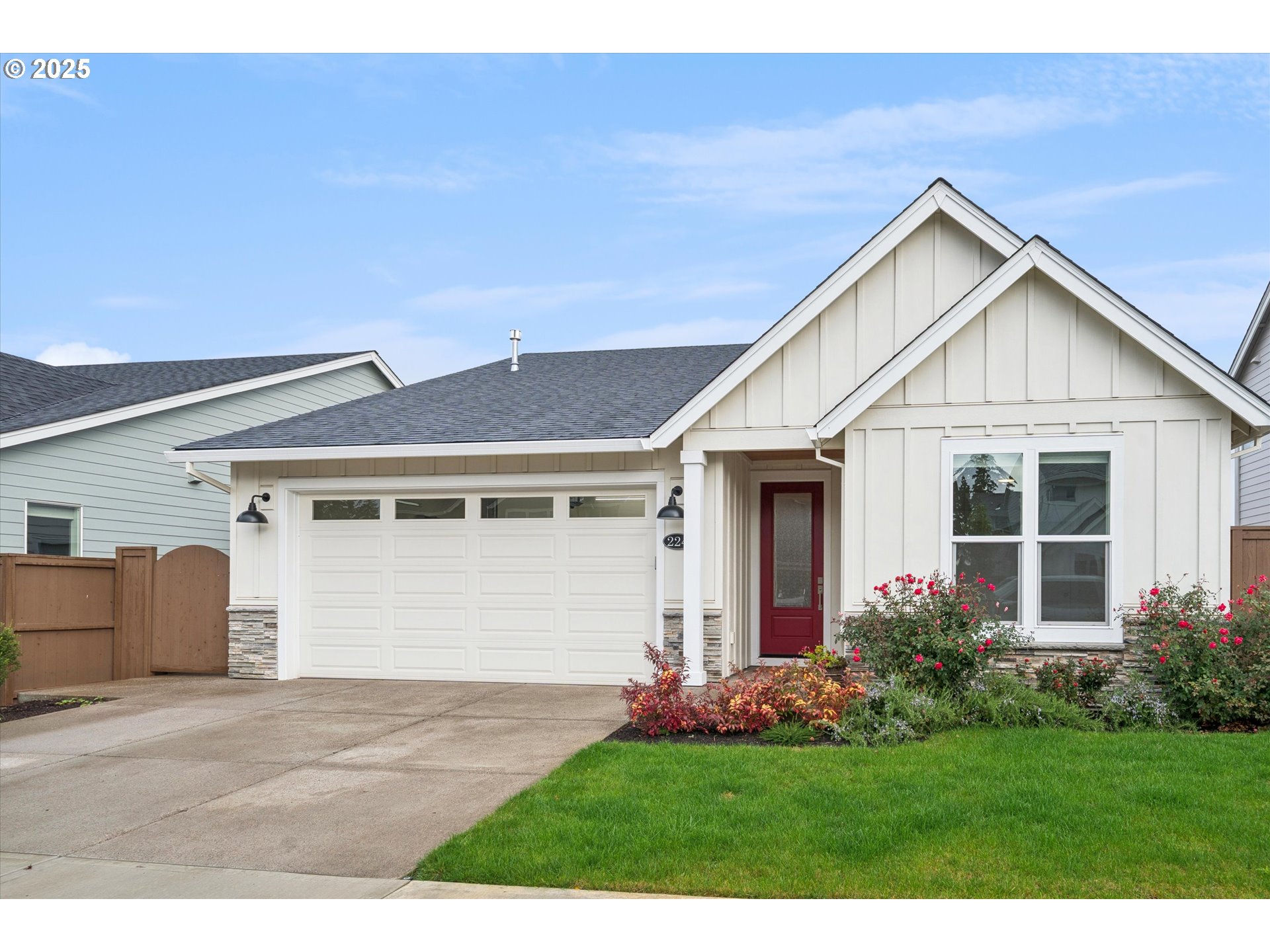 224 Southwest 18th Avenue Canby, OR 97013 - Photo 1 of 40 a view of a house with a yard and garage