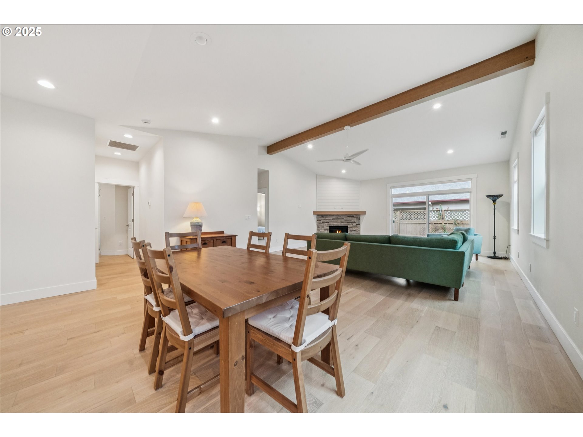224 Southwest 18th Avenue Canby, OR 97013 - Photo 11 of 40 a view of a dining room with furniture and wooden floor