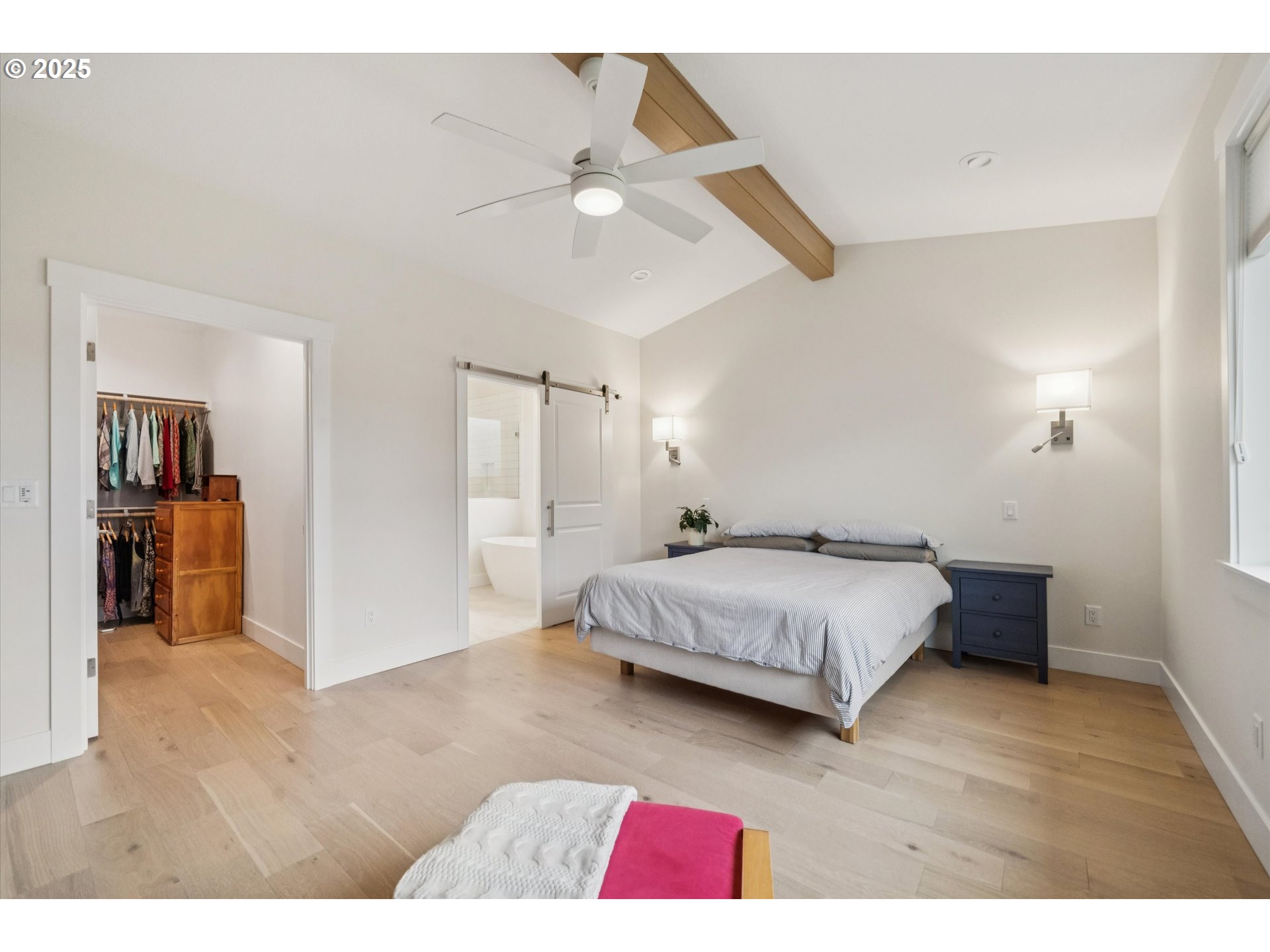 224 Southwest 18th Avenue Canby, OR 97013 - Photo 20 of 40 a spacious bedroom with a bed and a cabinets