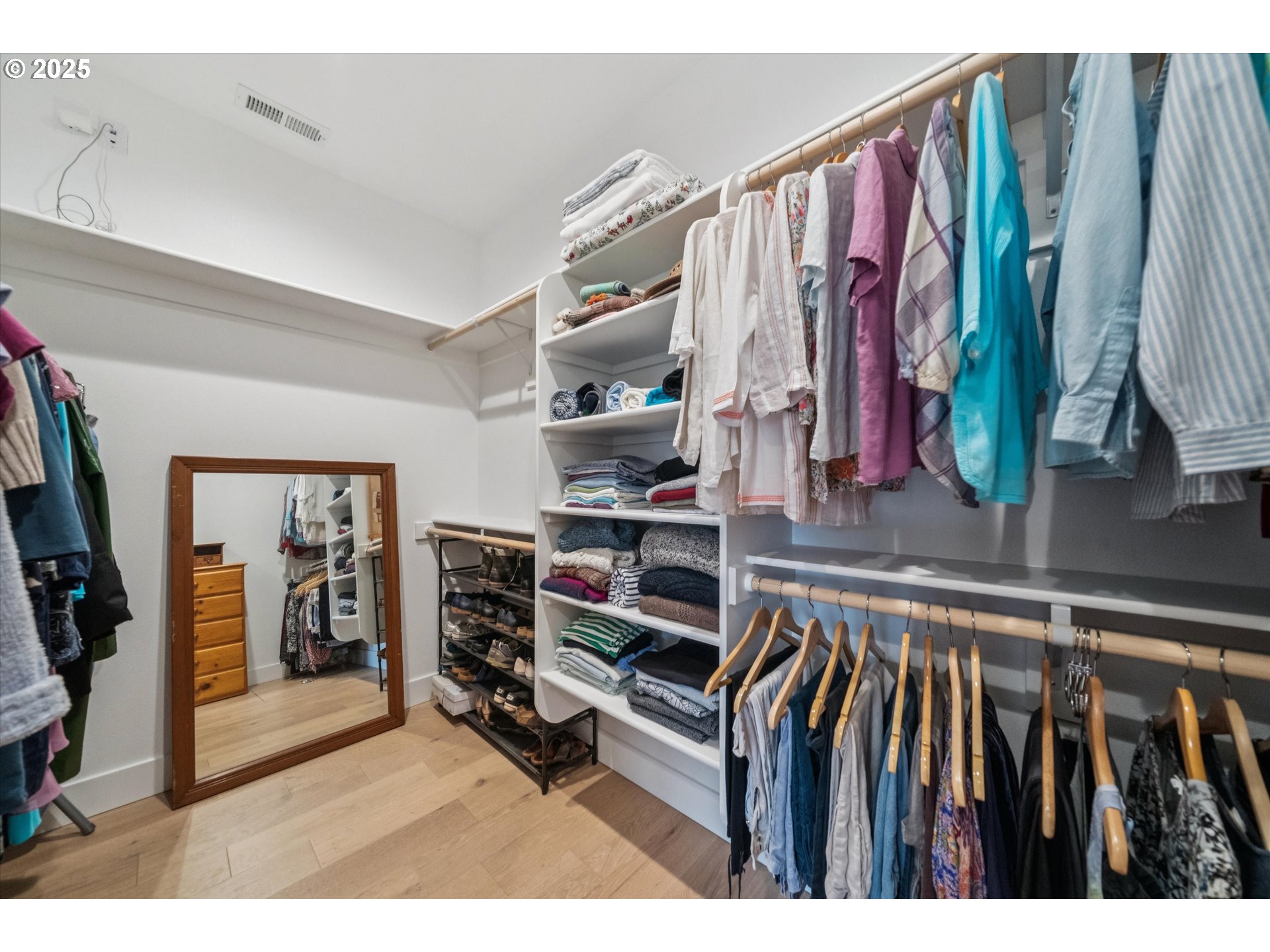 224 Southwest 18th Avenue Canby, OR 97013 - Photo 26 of 40 a view of walk in closet with clothes and shoes