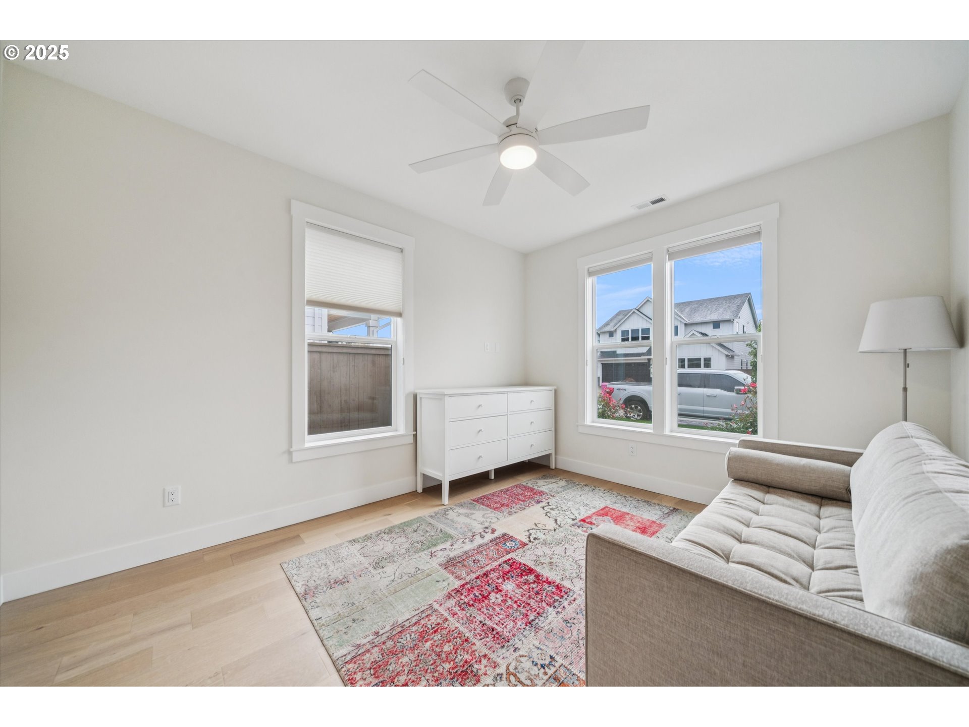 224 Southwest 18th Avenue Canby, OR 97013 - Photo 27 of 40 a living room with furniture and a window