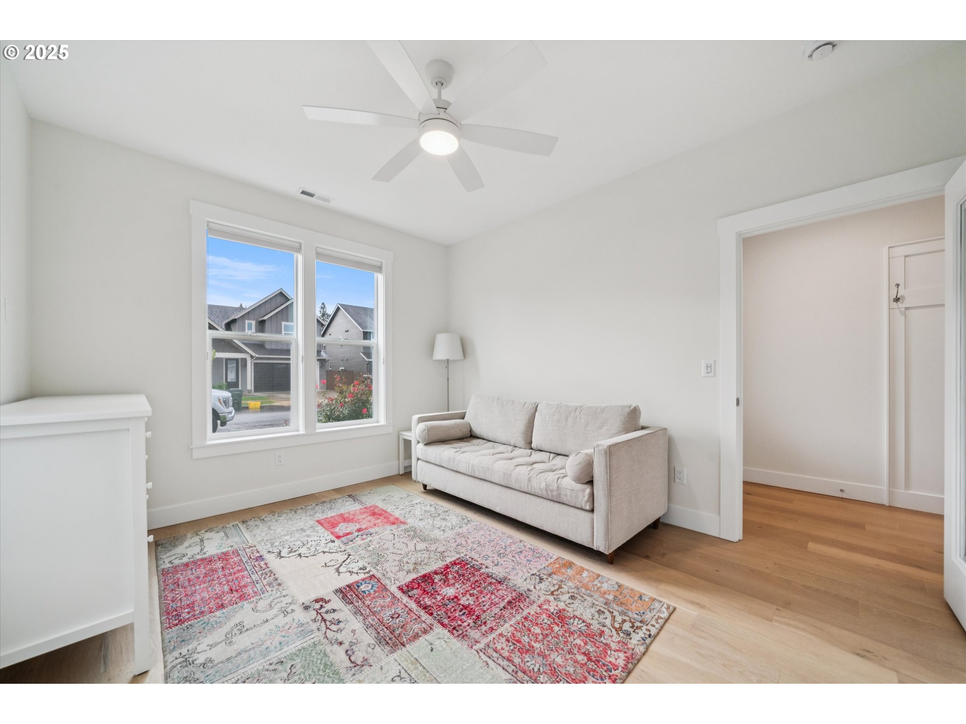 224 Southwest 18th Avenue Canby, OR 97013 - Photo 28 of 40 a living room with furniture and a rug