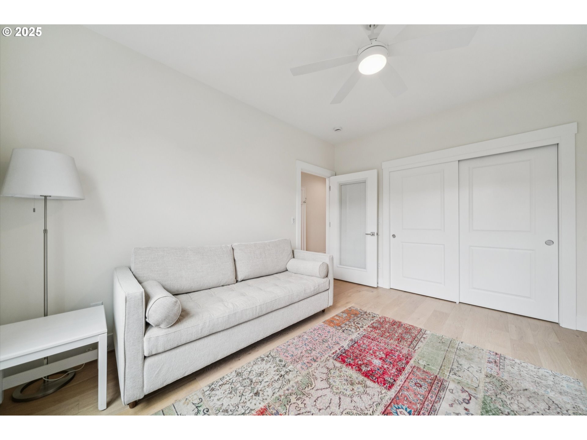 224 Southwest 18th Avenue Canby, OR 97013 - Photo 29 of 40 a living room with furniture and a lamp