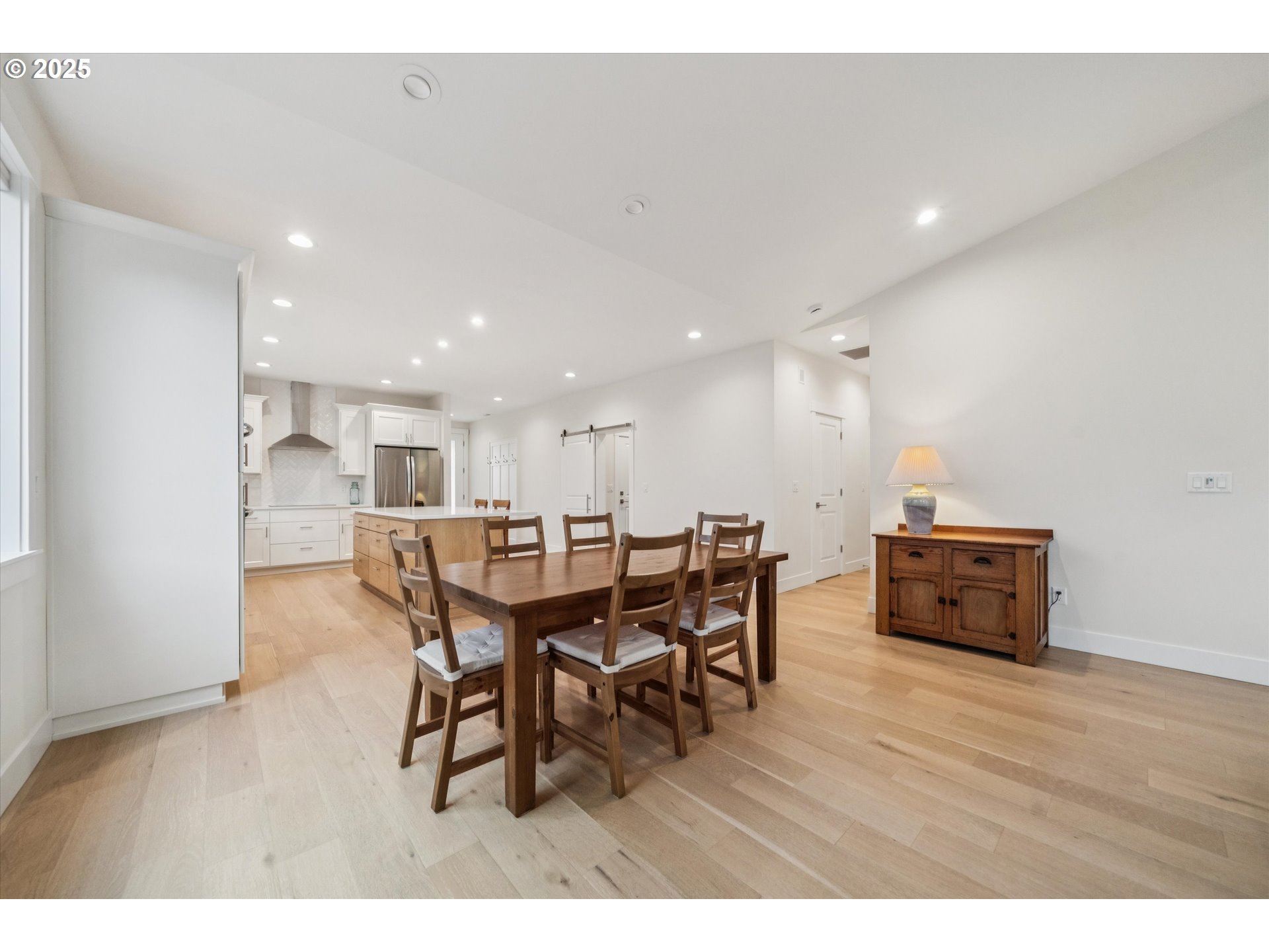 224 Southwest 18th Avenue Canby, OR 97013 - Photo 8 of 40 a dining room with furniture and wooden floor