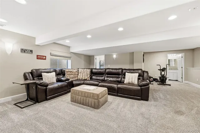 a living room with furniture and a couch